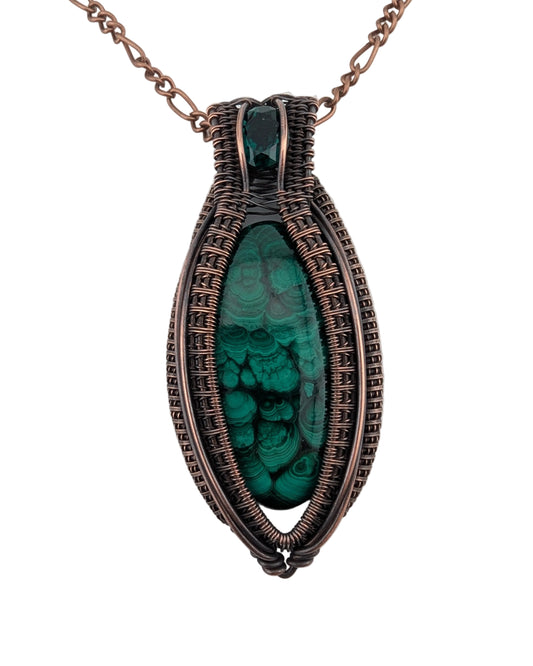 Necklace with a green stone pendant on a white background